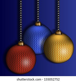 three Christmas-tree decorations