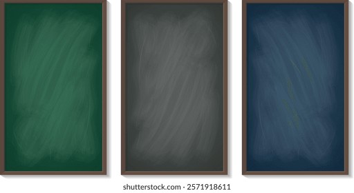 Three classic dark gray, green and navy blue chalkboards in wooden frames, empty blackboards for school classroom, cafe or restaurant menu
