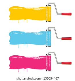 Tres pinceles de rodillos de color