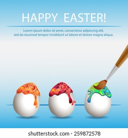 Three colored Easter eggs on a blue background