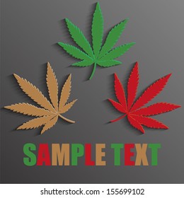 Three colored leaves of cannabis