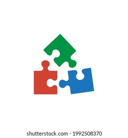 Three colored puzzle pieces, abstract symbol icons isolated on white background