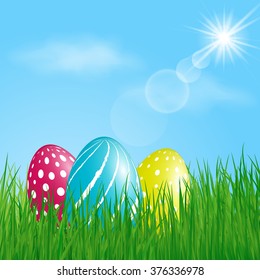 Three colorful Easter Eggs in the grass on sunny sky background. Vector illustration.