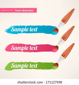 three colorful paint brushes leaving a horizontal trail 