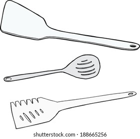Three cooking spatulas over isolated white background