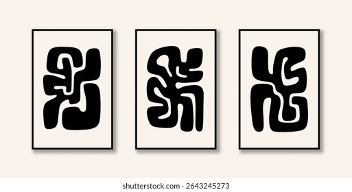 Three creative artistic paintings with abstract pictograms with organic fluid shapes, in black color displayed on the wall