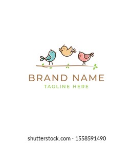 Three Cute Little Colorful Bird On A Branch Logo Template EPS 10