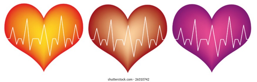 three different colored plastic hearts with white cardiogram line