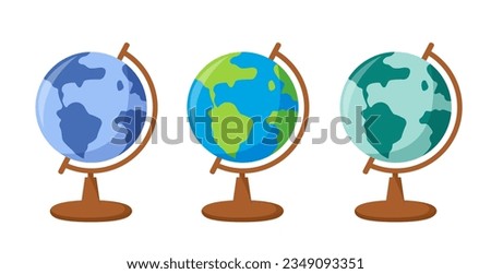 Three different globes on a white background. School globe. Isolated on a white background.	
