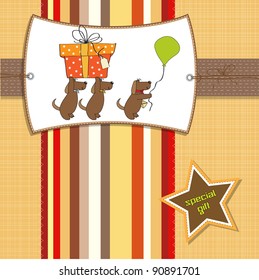 three dogs that offer a big gift. birthday greeting card