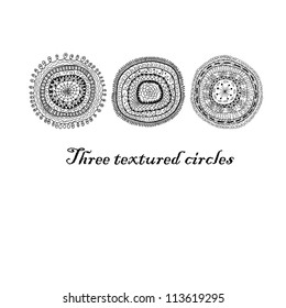 Three doodle circles background.