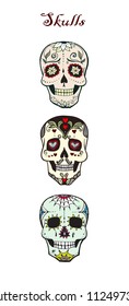 Three doodle stylized colorful skulls