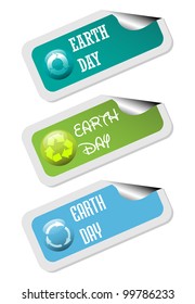 Three earth day stickers made in various styles