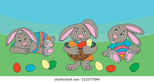 three easter bunnies on a grass background