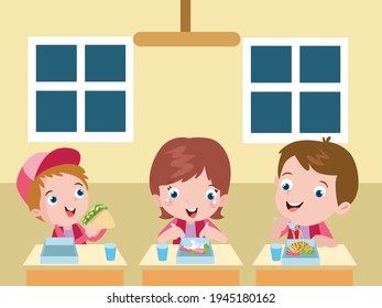 Three elementary school students having lunch together in the school canteen