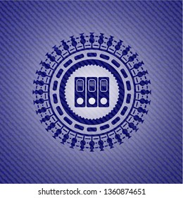 three folders icon inside badge with denim texture