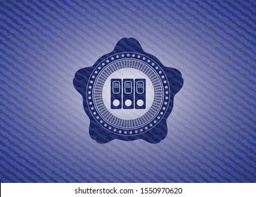 three folders icon inside badge with denim texture