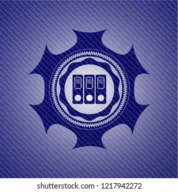 three folders icon inside emblem with jean background