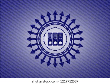 three folders icon inside emblem with jean background