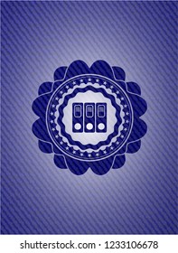 three folders icon inside emblem with jean background