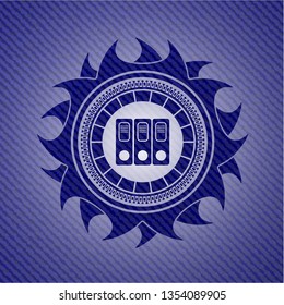 three folders icon inside emblem with jean background