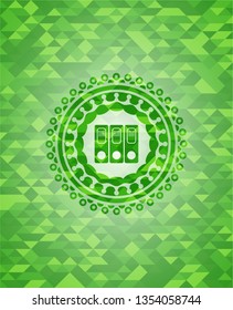 three folders icon inside green emblem with mosaic background