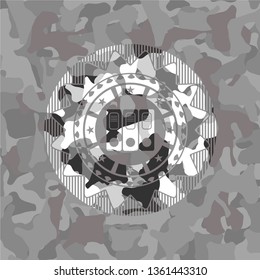 three folders icon inside grey camo emblem