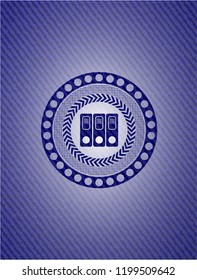 three folders icon inside jean or denim emblem or badge background