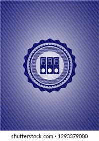 three folders icon inside jean or denim emblem or badge background