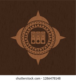 three folders icon inside retro wood emblem