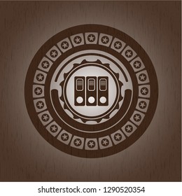 three folders icon inside retro style wood emblem