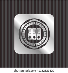 three folders icon inside silver shiny emblem