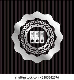three folders icon inside silvery emblem
