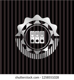 three folders icon inside silvery badge