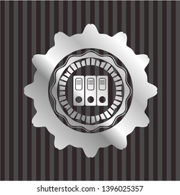 three folders icon inside silvery emblem or badge