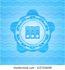 three folders icon inside sky blue water badge background.