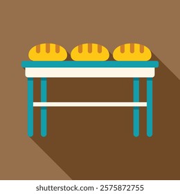 Three fresh loaves of bread resting on a bakery table, showcasing the bakery's craftsmanship