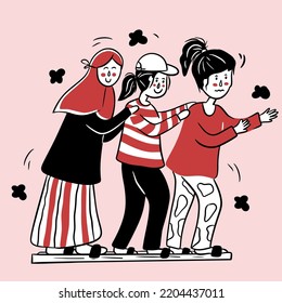 Three girls are participating in bakiak contest for celebrating independence day of indonesia
