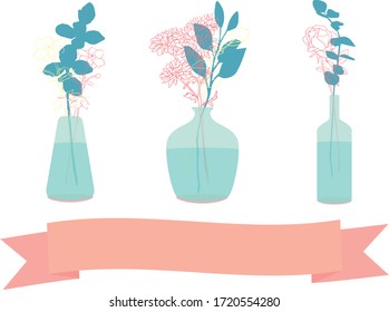 three glass vases with flowers