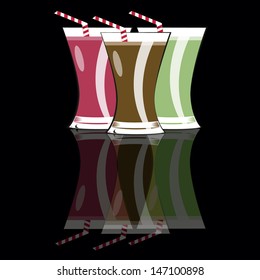 three glasses of fruit or vegetable juice reflected on a black surface.