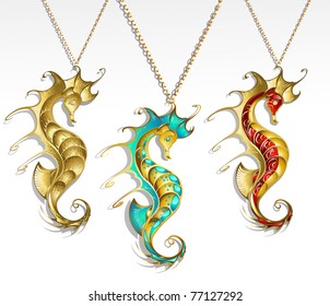 three gold jewelry inlaid seahorse turquoise and red paint with a shiny gold chain