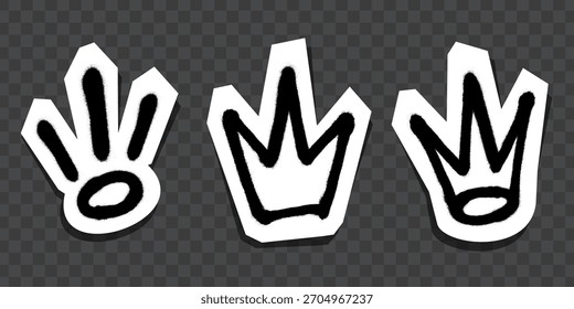 Three graffiti-style crown and symbol stickers in black with white outlines, shown on a dark transparent background, urban street art concept