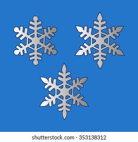 three gray snowflakes, winter snow, on blue background, vector