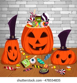 Three Halloween pumpkins on the wooden table. 2 pumpkins in hat and 1 bucket with holiday sweets, such as candy, lollipop, eyeball, zombie, etc. Happy Halloween background. Vector