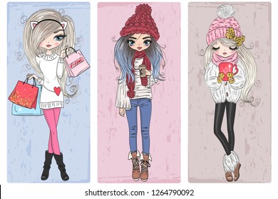 Three hand drawn beautiful cute winter girls. Vector illustration.