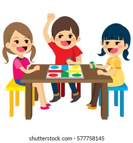 Three Happy Friends Kids Sitting Playing Board Game