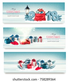 Tres banderas navideñas con cajas de regalo y 2018. Vector