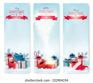 Three holiday Christmas banners with presents. Vector. 