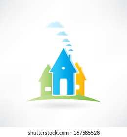 three houses are on a hill
