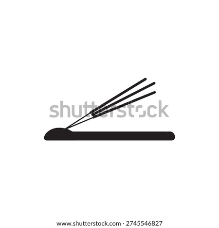 Three incense sticks smoldering on a surface, creating aromatic smoke for meditation.